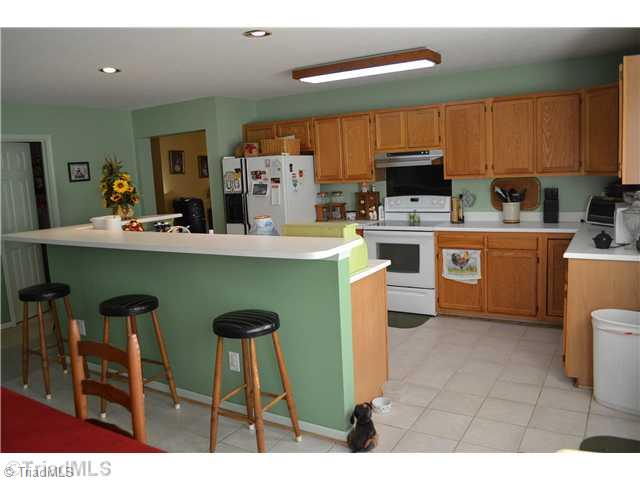 7535 Strawberry Road Summerfield, NC 27358 - Photo 6 of 13 Kitchen.