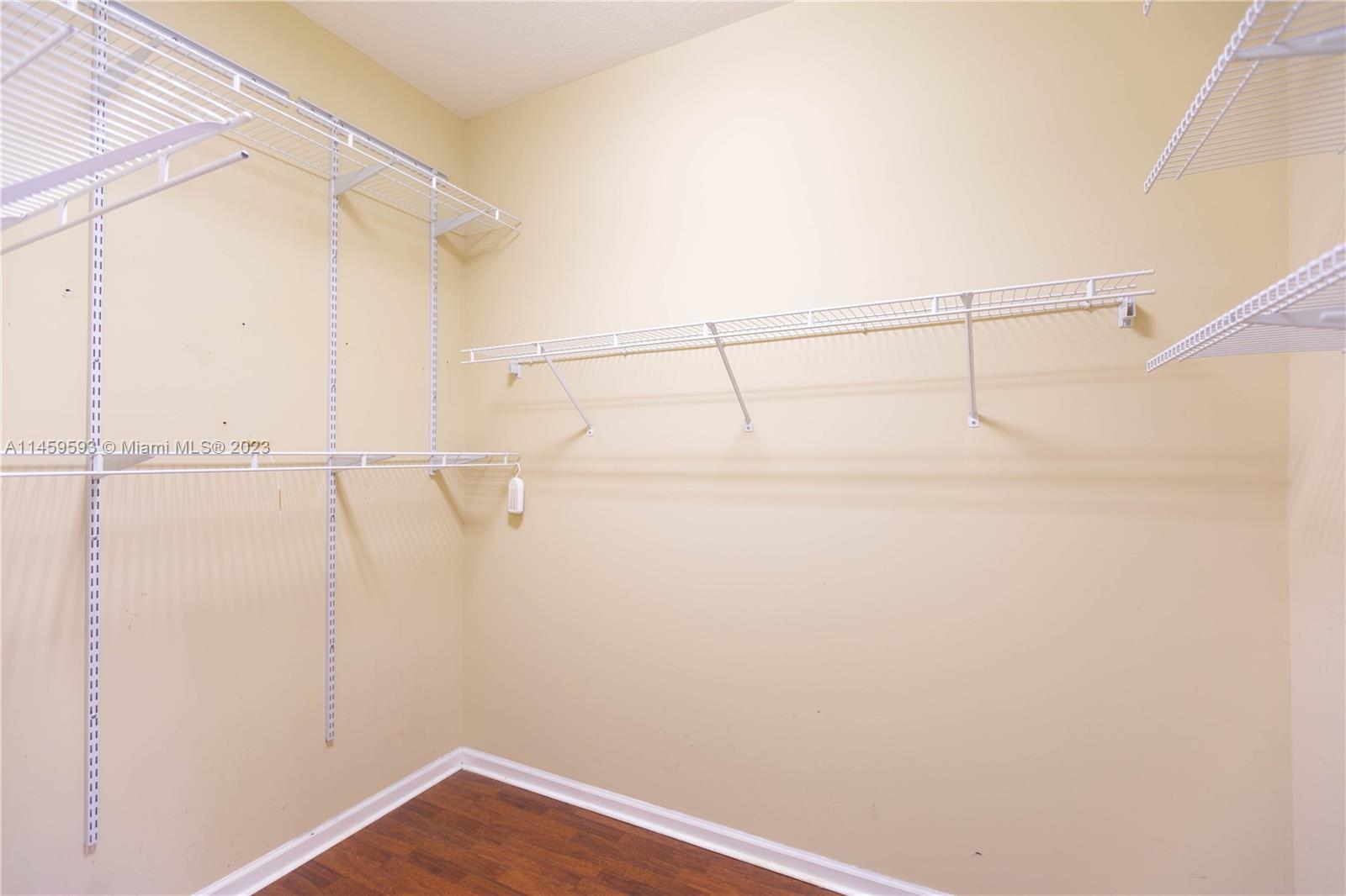 Sunset Lakes Miramar, FL 33029 - Photo 11 of 51 a view of small space with racks on the wall