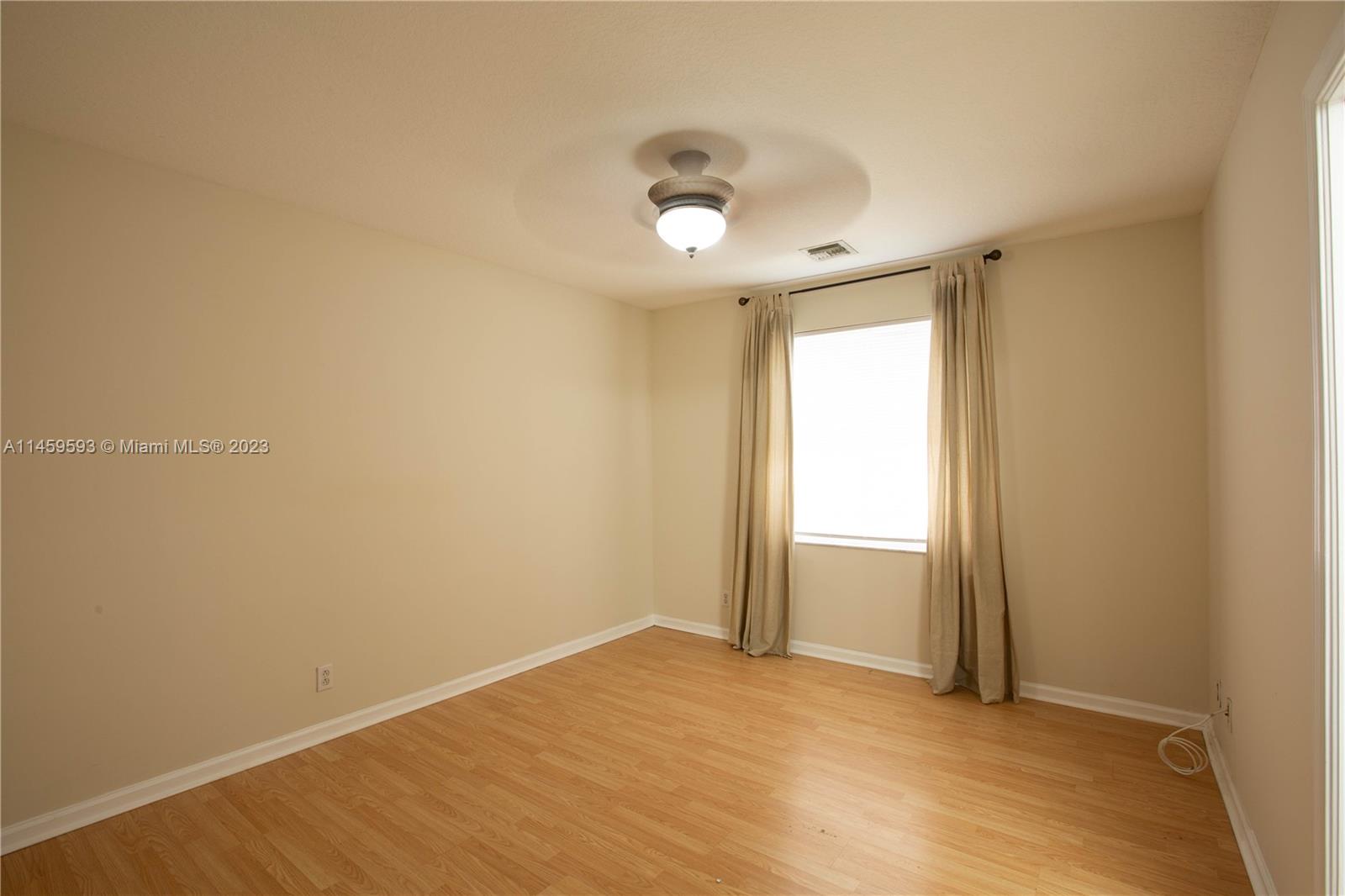 Sunset Lakes Miramar, FL 33029 - Photo 27 of 51 a view of an empty room with a window