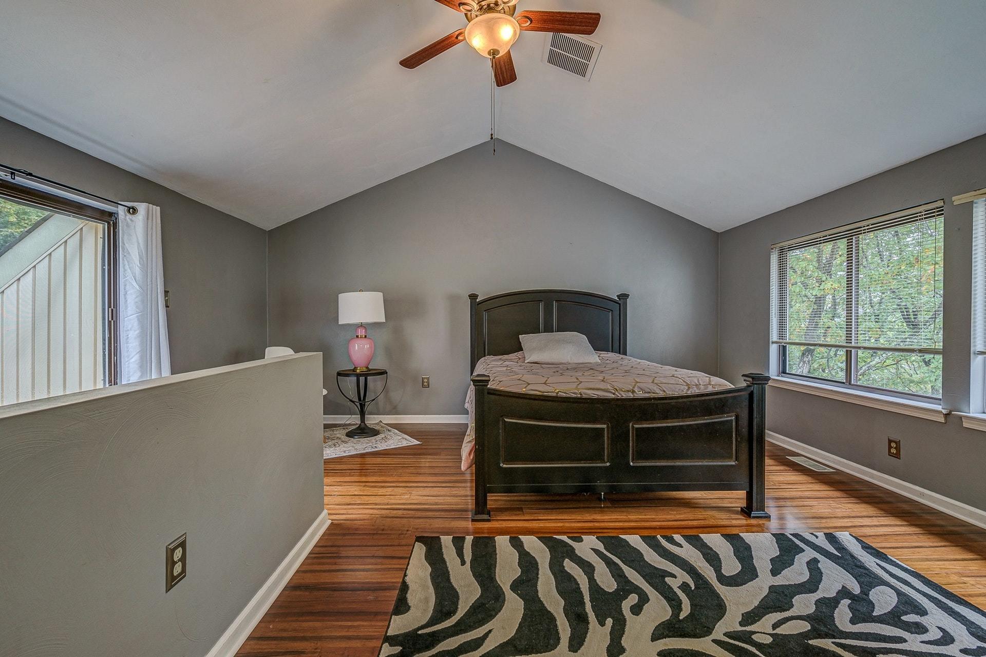 3269 Forest Ridge Road Roanoke, VA 24018 - Photo 12 of 14 a living room with furniture a rug and a floor to ceiling window