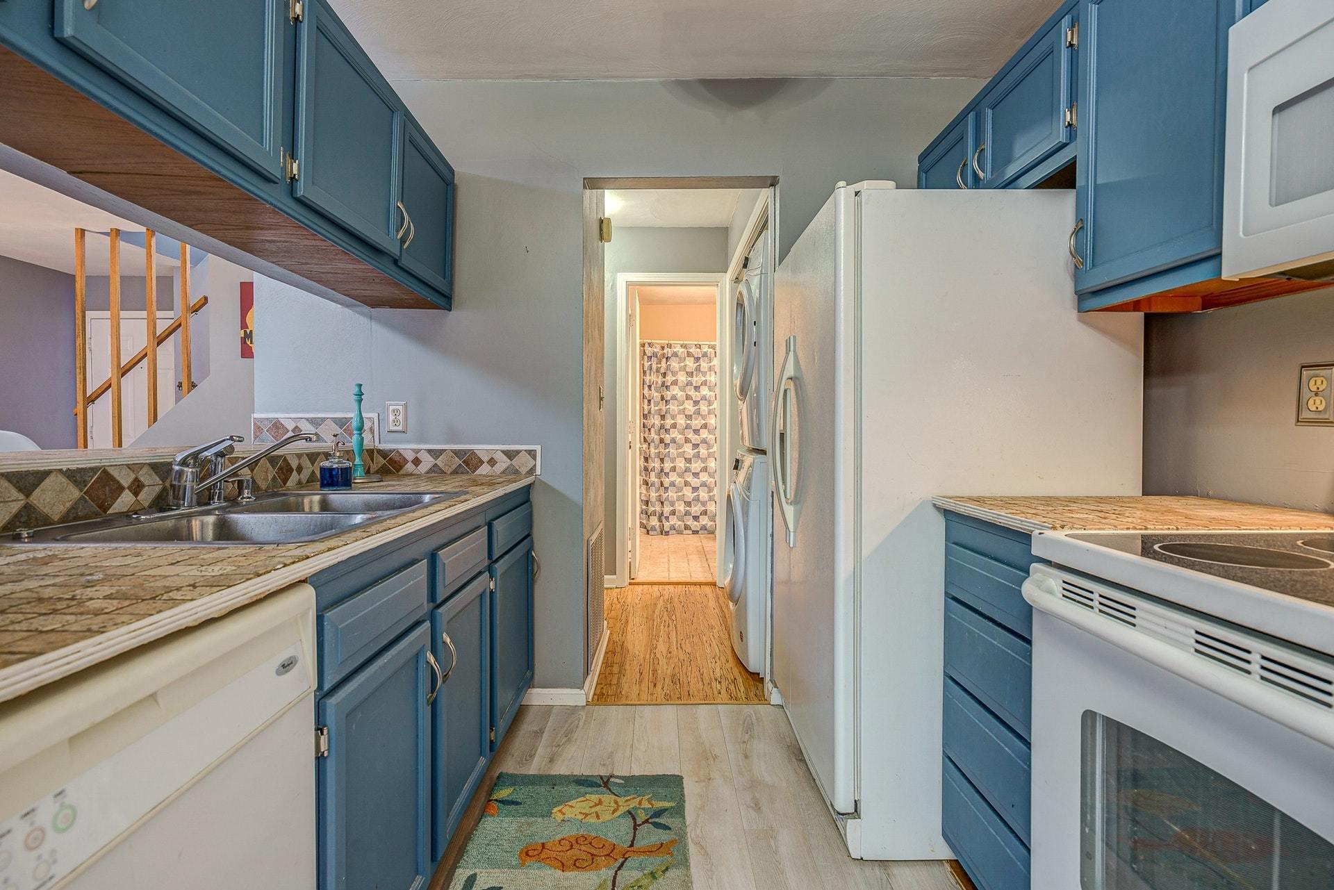 3269 Forest Ridge Road Roanoke, VA 24018 - Photo 9 of 14 a kitchen with cabinets and appliances