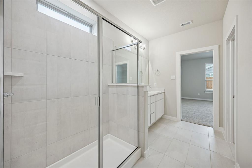 2109 Sunshining Road Princeton, TX 75407 - Photo 20 of 35 Primary Bathroom in the Stanley II home plan by Trophy Signature Homes – REPRESENTATIVE PHOTO