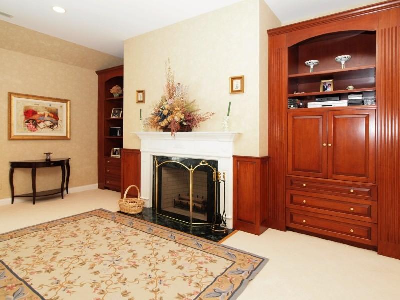 284 Hawks Hill Road New Canaan, CT 06840 - Photo 12 of 23 a living room with furniture and a fireplace