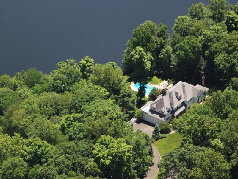 284 Hawks Hill Road New Canaan, CT 06840 - Photo 21 of 23 an aerial view of a house with a yard and outdoor seating