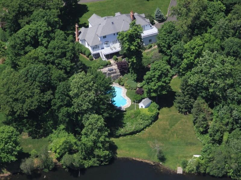 284 Hawks Hill Road New Canaan, CT 06840 - Photo 22 of 23 an aerial view of a house with a yard