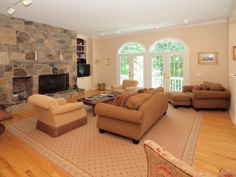 284 Hawks Hill Road New Canaan, CT 06840 - Photo 4 of 23 a living room with furniture and a fireplace