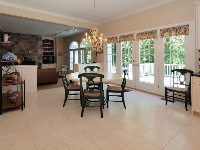 284 Hawks Hill Road New Canaan, CT 06840 - Photo 7 of 23 a living room with furniture and a large window