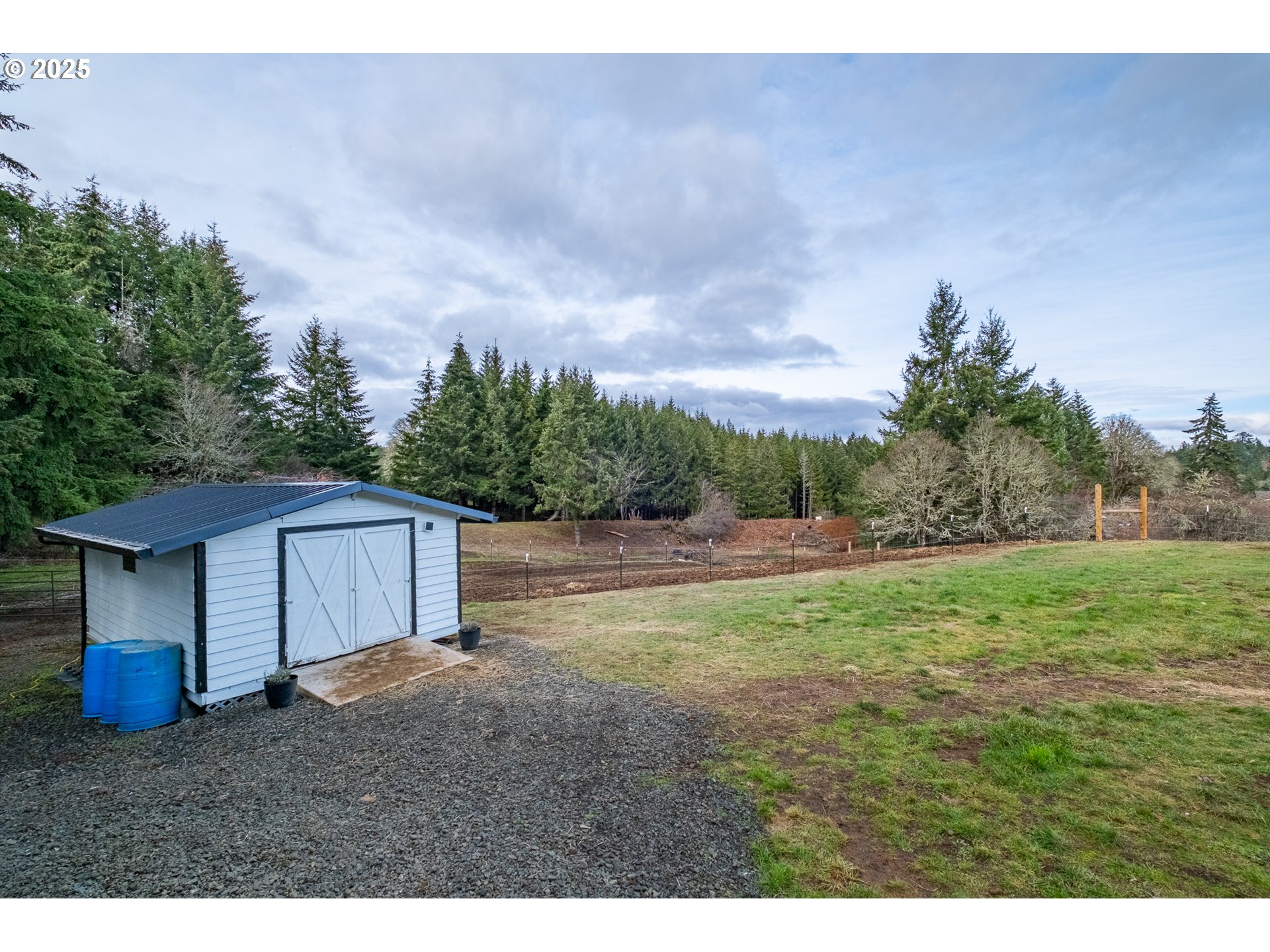 15105 Orchard Knob Road Dallas, OR 97338 - Photo 42 of 48 a view of a backyard with large trees