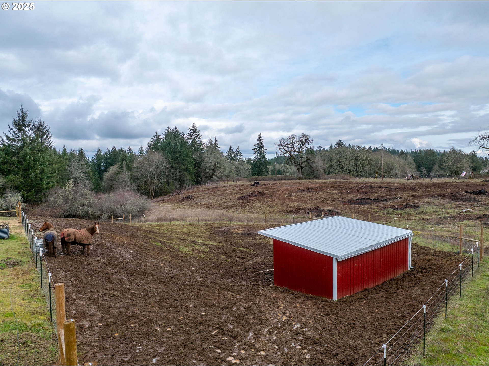 15105 Orchard Knob Road Dallas, OR 97338 - Photo 8 of 48 a view of a field with trees in the background