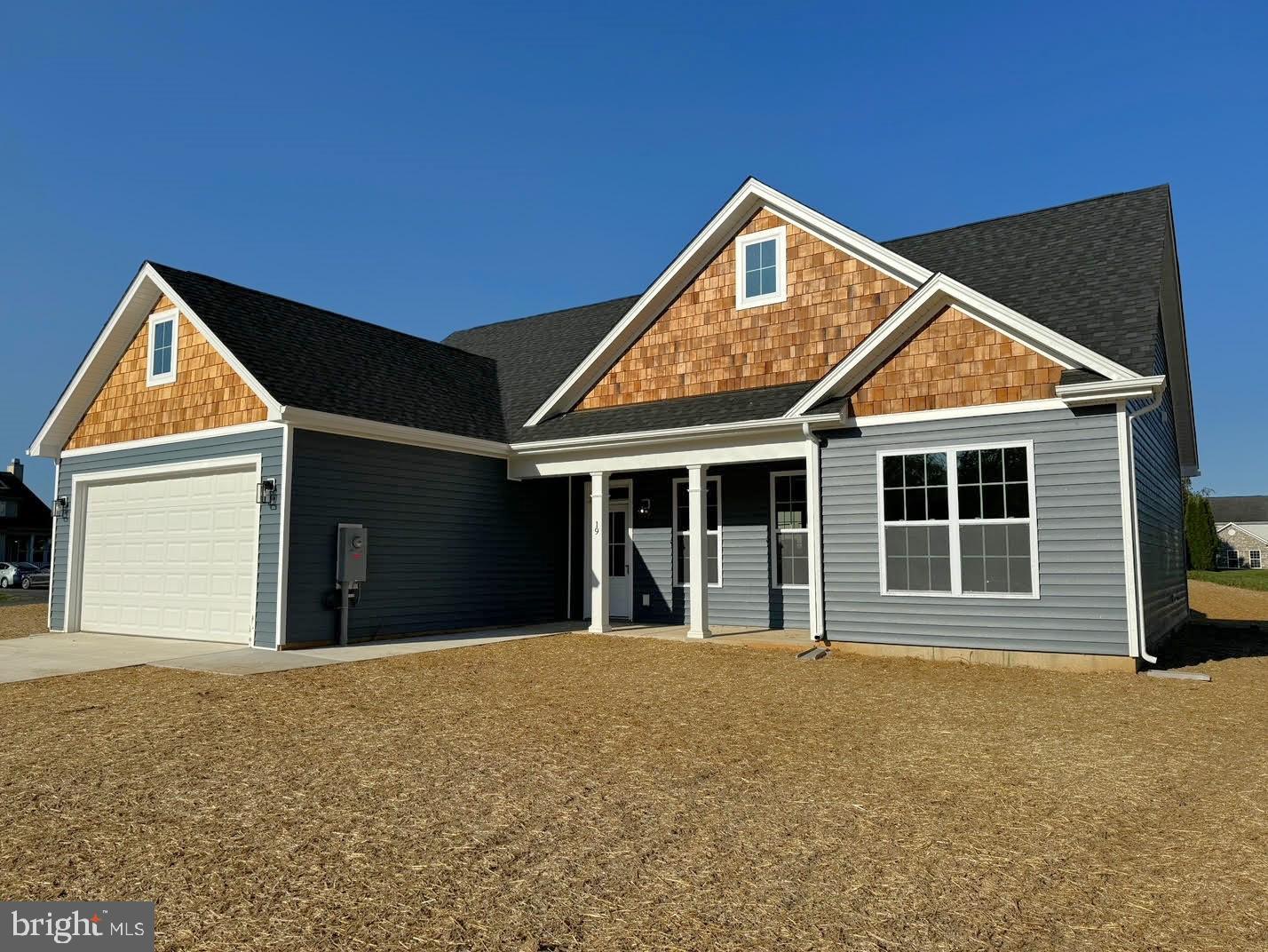 Tbd Tbd Glenaire Road Bunker Hill, WV 25413 - Photo 22 of 23 a front view of a house with a garden and yard