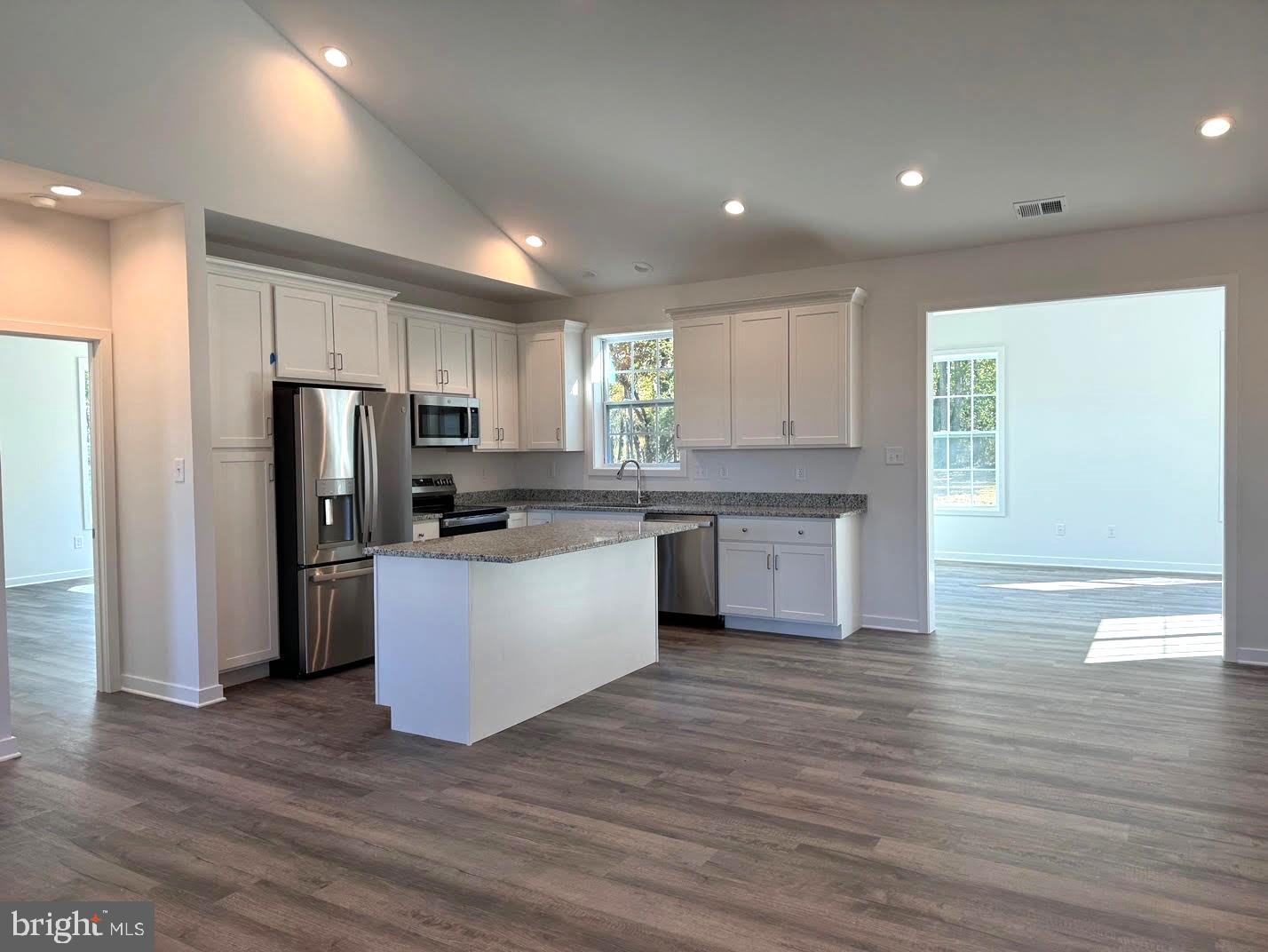 Tbd Tbd Glenaire Road Bunker Hill, WV 25413 - Photo 4 of 23 a kitchen with a refrigerator and a stove top oven