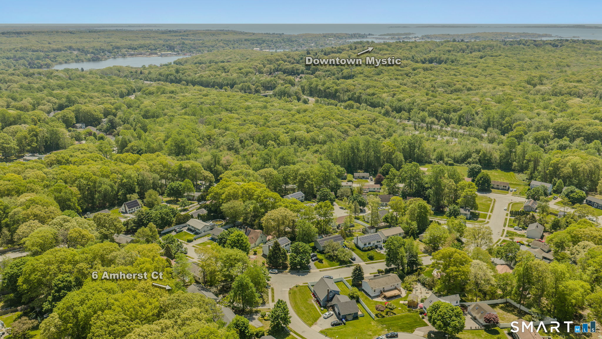 6 Amherst Court Groton, CT 06355 - Photo 38 of 40 a view of a field with an ocean