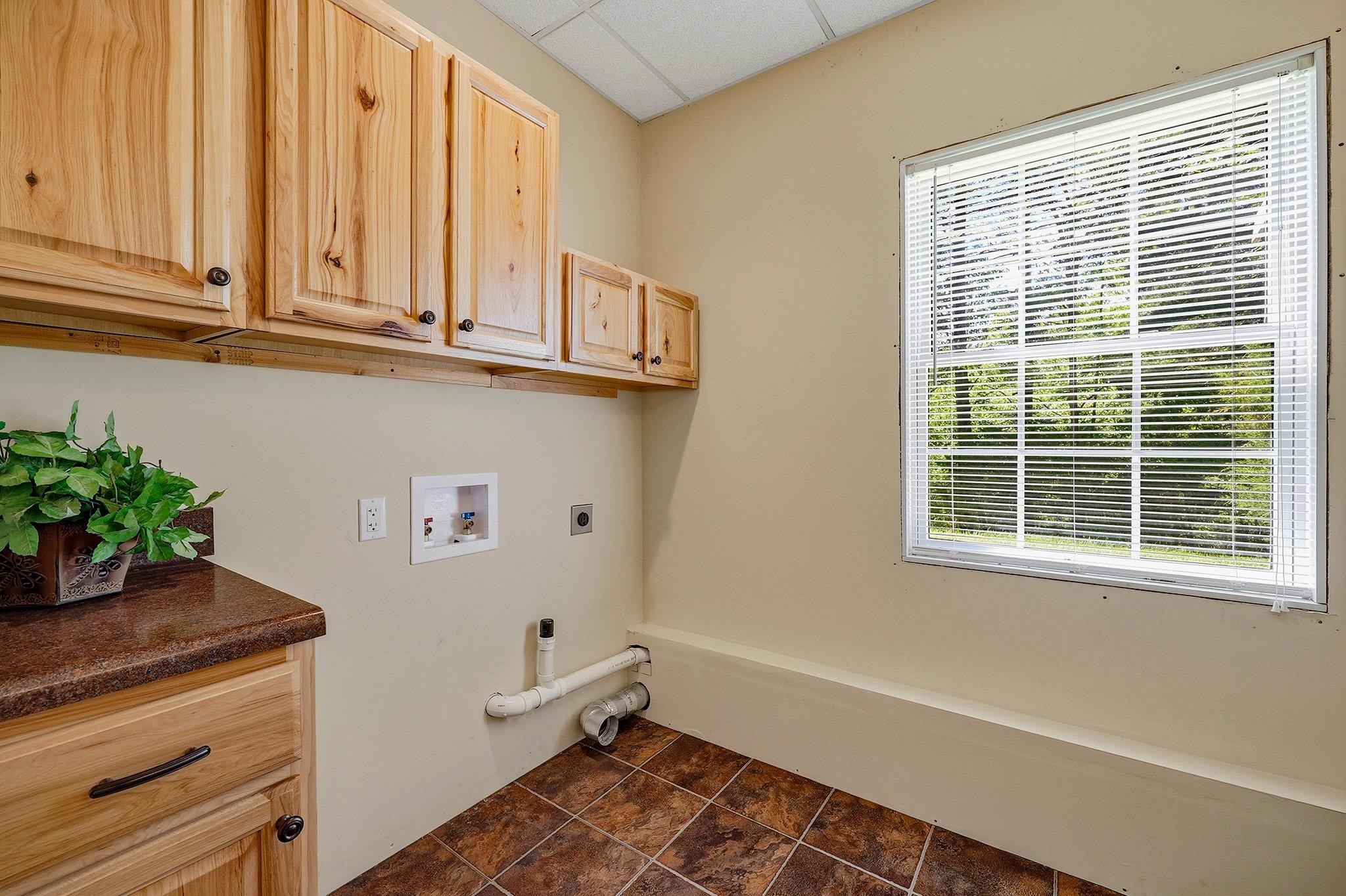 759 Rife's Ford Road Verona, VA 24482 - Photo 44 of 66 a bathroom with a window and a potted plant