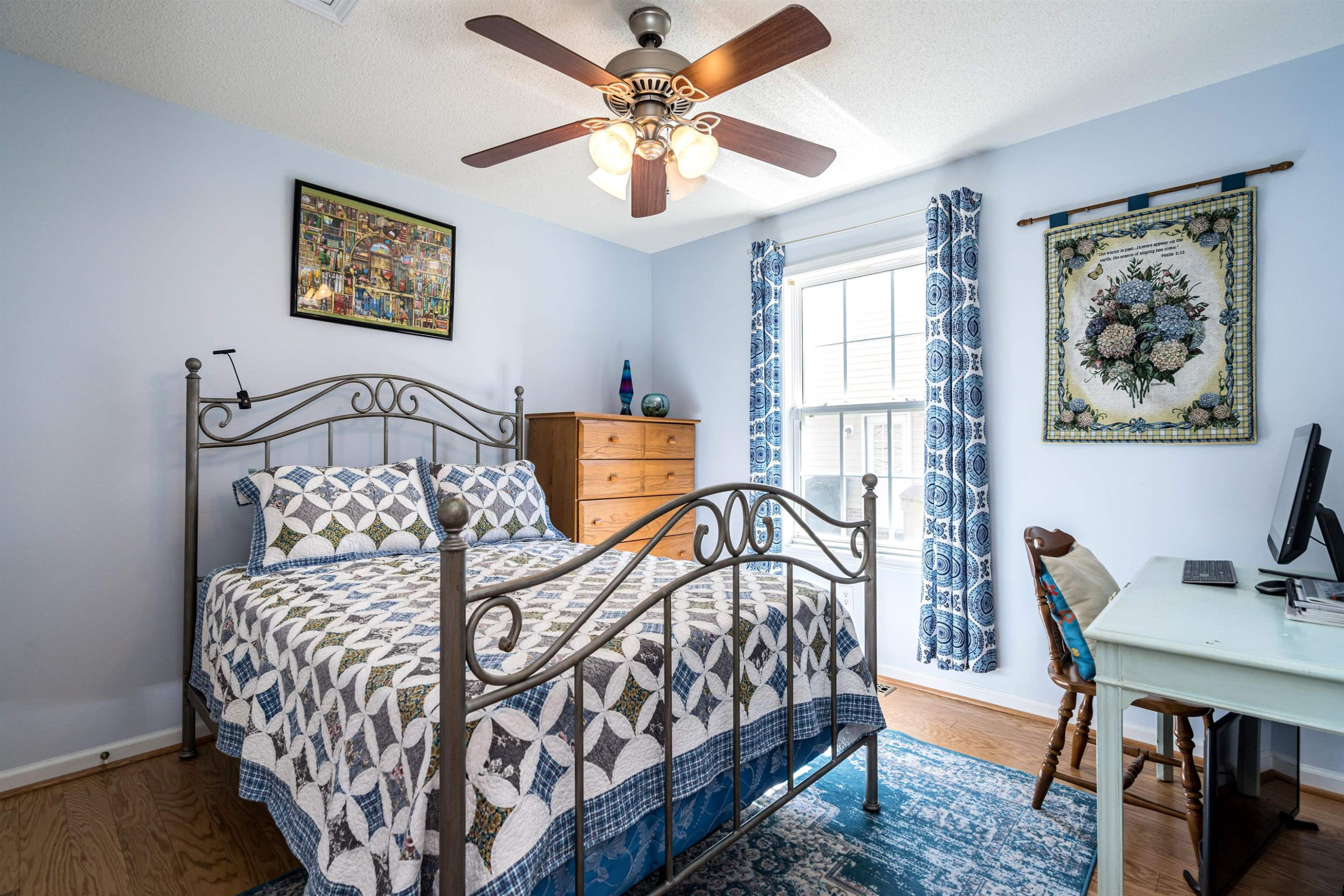 180 Mickleson Ridge Drive Raleigh, NC 27603 - Photo 18 of 32 Second Bedroom with Lighted Ceiling Fan