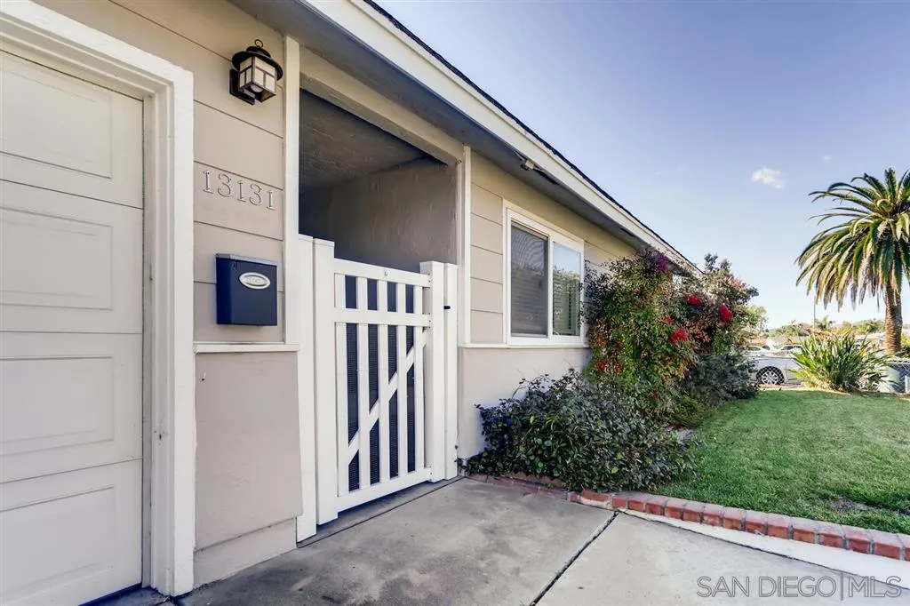 13131 Chrissy Way Lakeside, CA 92040 - Photo 1 of 25 a view of a house with a small yard and plants