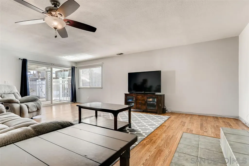 13131 Chrissy Way Lakeside, CA 92040 - Photo 13 of 25 a living room with furniture and a flat screen tv
