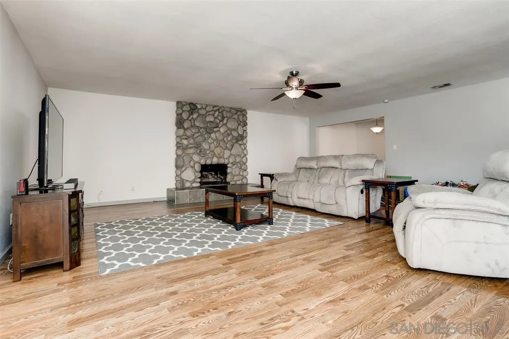 13131 Chrissy Way Lakeside, CA 92040 - Photo 14 of 25 a living room with furniture and a flat screen tv