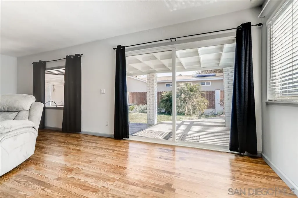 13131 Chrissy Way Lakeside, CA 92040 - Photo 15 of 25 a view of a big room with wooden floor and windows