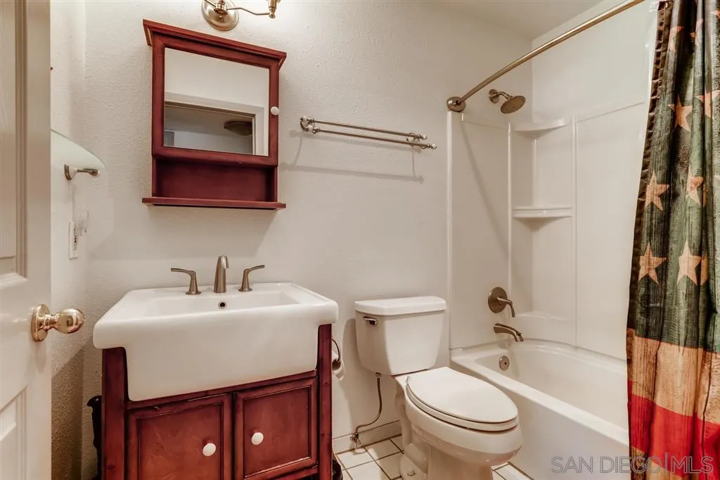 13131 Chrissy Way Lakeside, CA 92040 - Photo 21 of 25 a bathroom with a sink toilet vanity and shower
