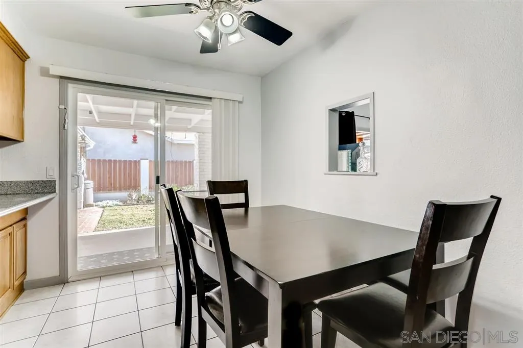 13131 Chrissy Way Lakeside, CA 92040 - Photo 6 of 25 a view of a dining room with furniture and a window