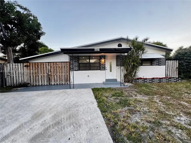 a view of street from balcony