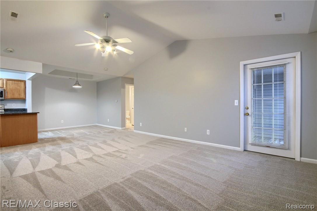 11822 Farmington Road, Unit 72 Livonia, MI 48150 - Photo 8 of 31 9-Living Room 4th View.jpg