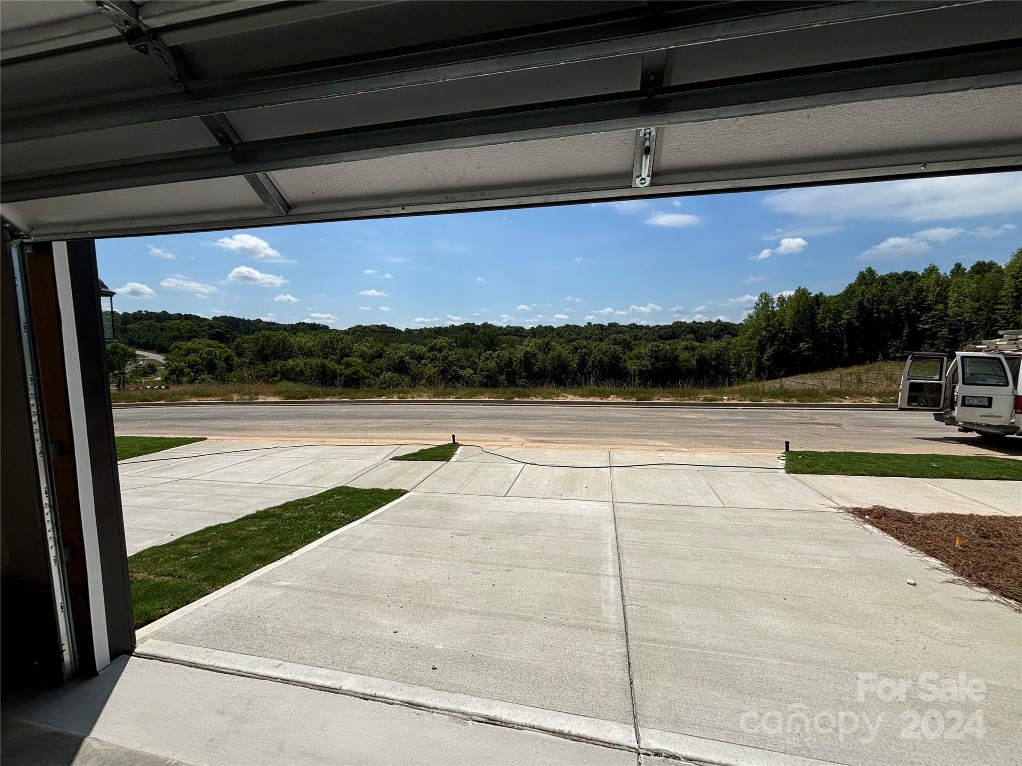 1133 Lost Cv Road Indian Land, SC 29707 - Photo 35 of 42 a view of swimming pool with seating area and trees in the background