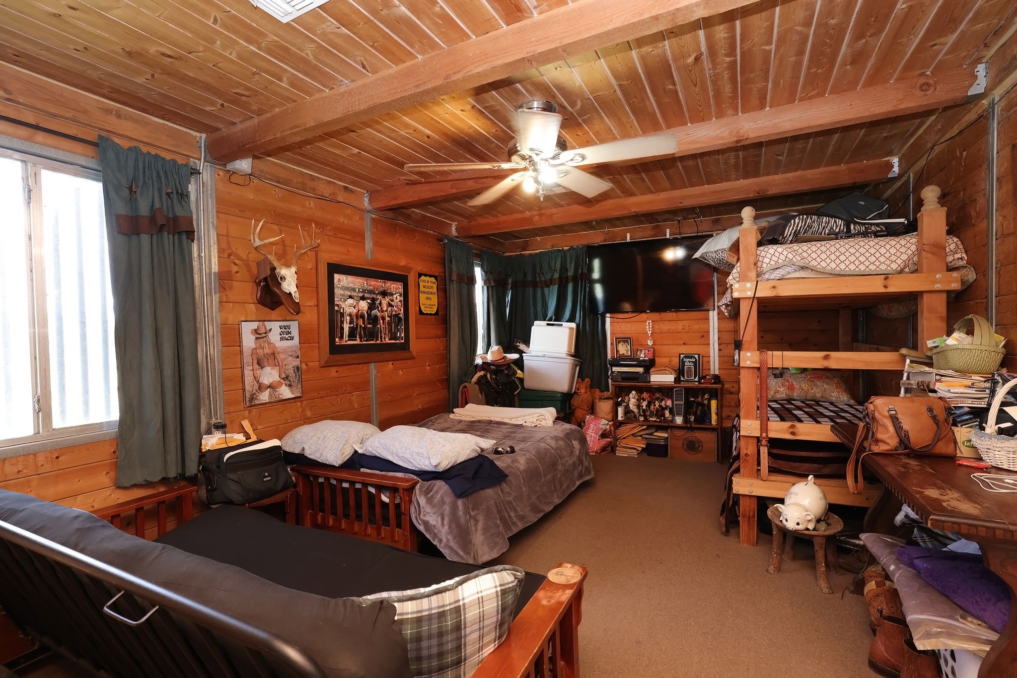 24783 Nine Bar Road Hempstead, TX 77445 - Photo 13 of 42 a outdoor living space with furniture and a fireplace