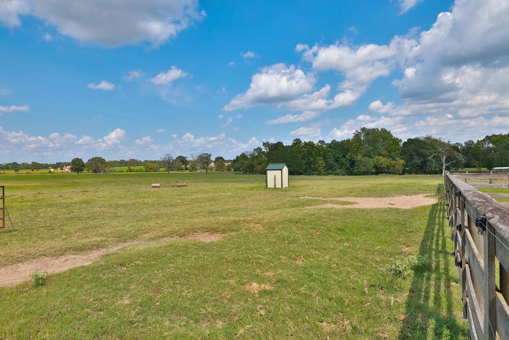 24783 Nine Bar Road Hempstead, TX 77445 - Photo 16 of 42 a view of a lake with a mountain in the background