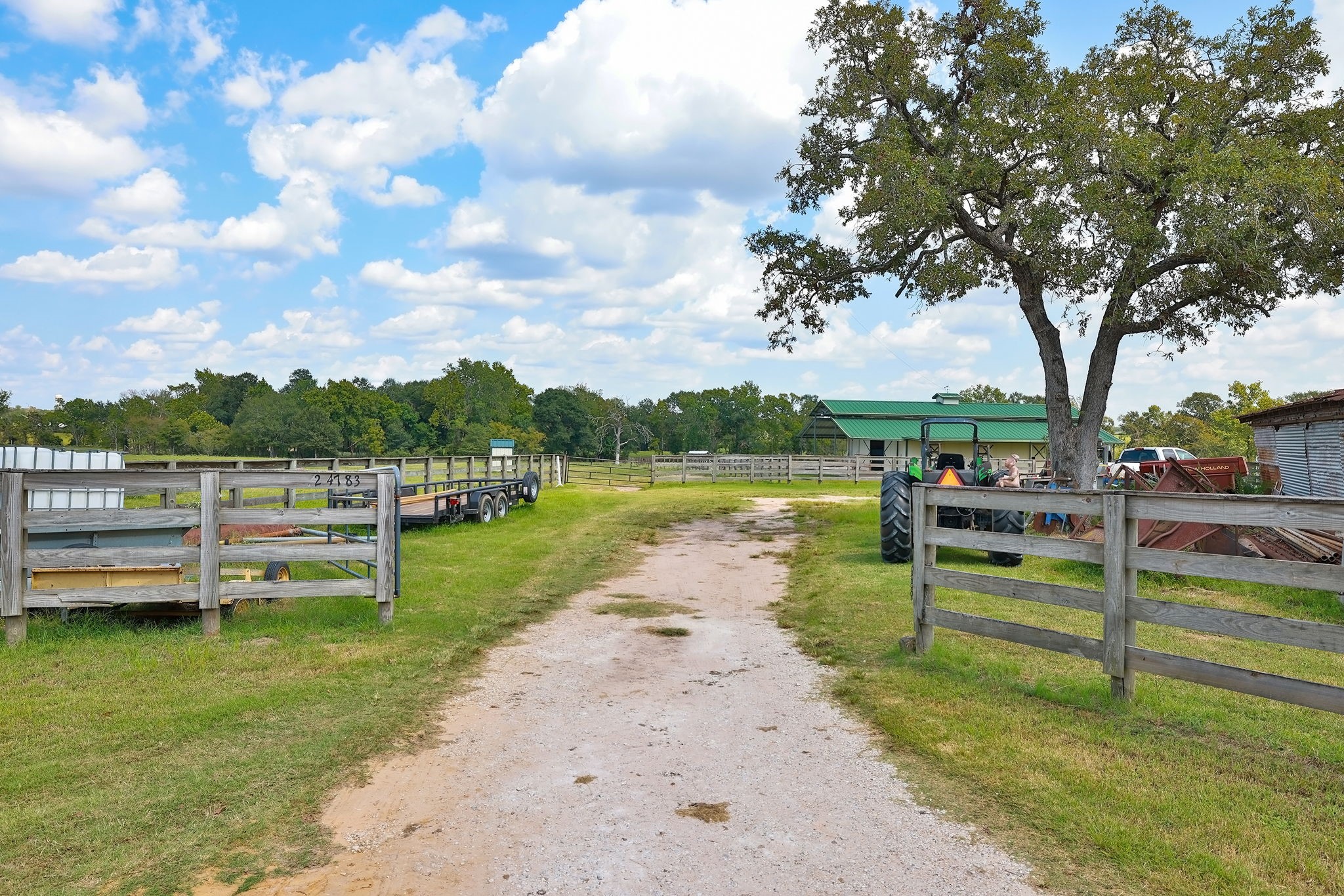 24783 Nine Bar Road Hempstead, TX 77445 - Photo 17 of 42 a view of a garden with houses