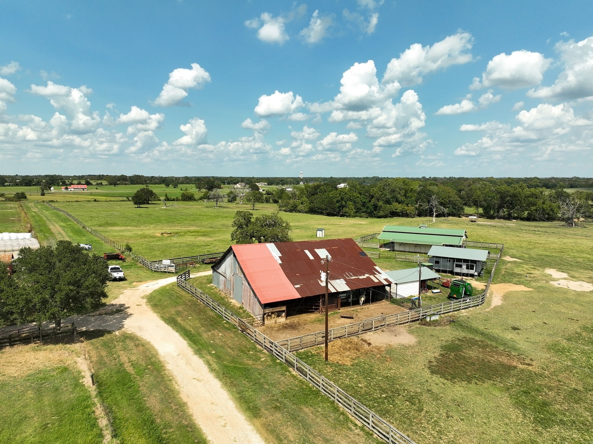 24783 Nine Bar Road Hempstead, TX 77445 - Photo 7 of 42 a view of a lake with a yard