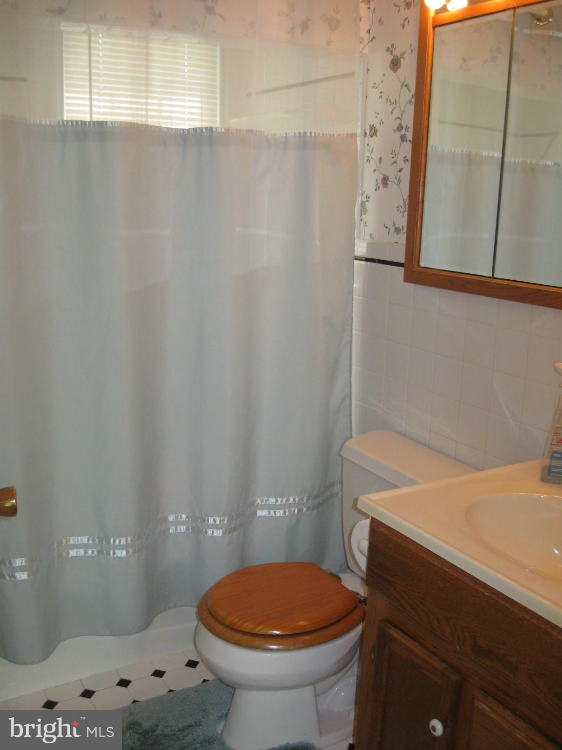 1607 Neely Road Silver Spring, MD 20903 - Photo 13 of 24 Full bath is nicely updated