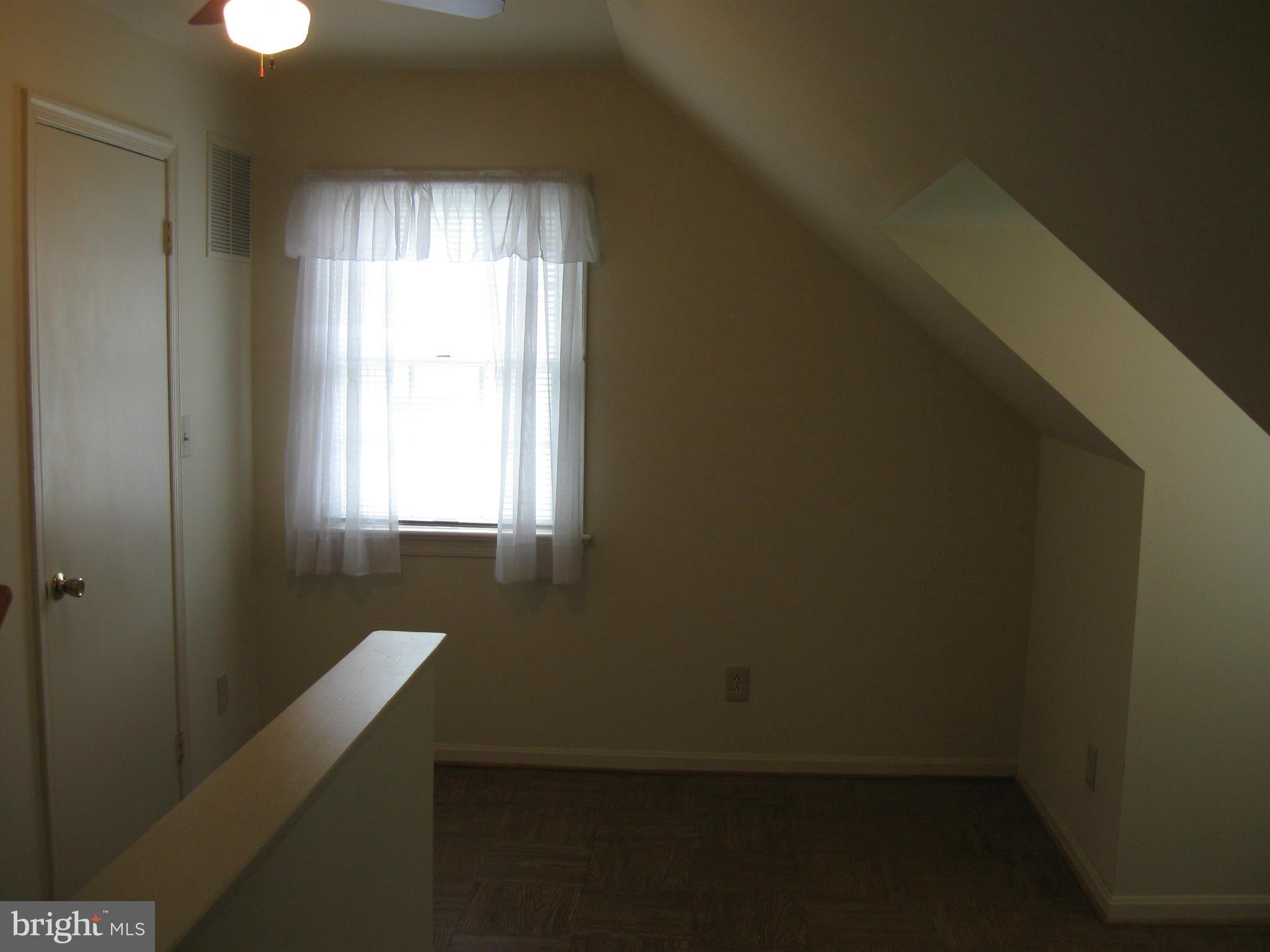 1607 Neely Road Silver Spring, MD 20903 - Photo 16 of 24 Upper level landing with walk-in storage closet