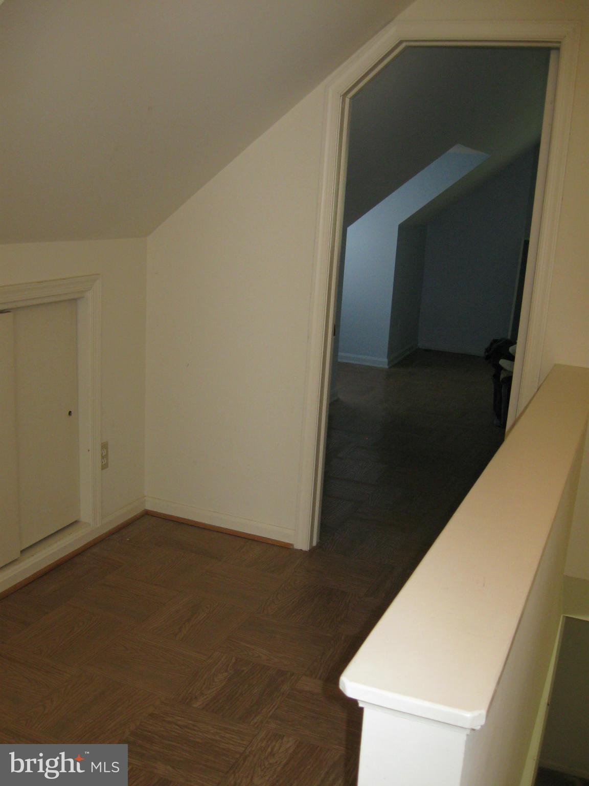 1607 Neely Road Silver Spring, MD 20903 - Photo 17 of 24 Den leads to upper level bedrooms