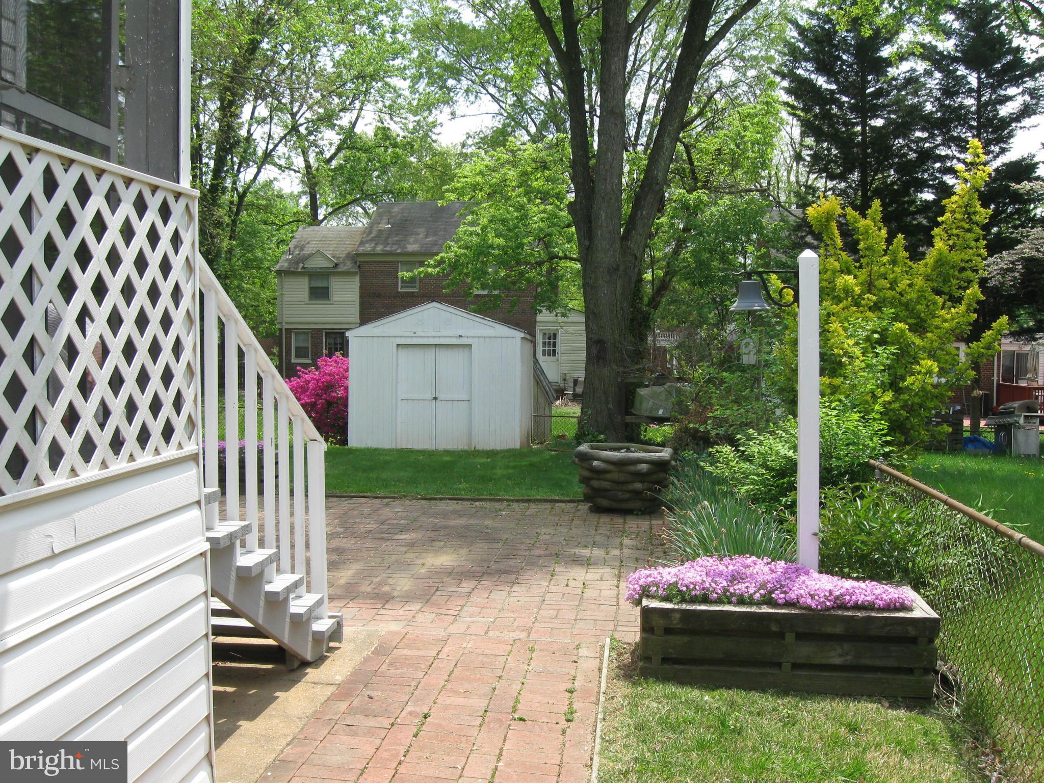 1607 Neely Road Silver Spring, MD 20903 - Photo 4 of 24 View of walkway to rear patio