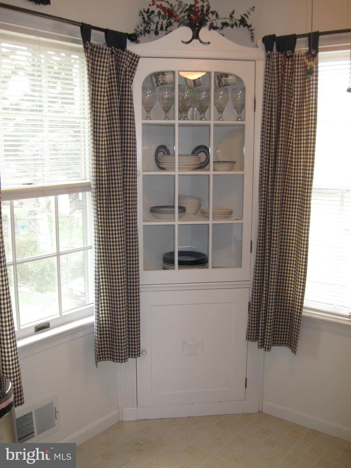 1607 Neely Road Silver Spring, MD 20903 - Photo 9 of 24 Built-in corner cupboard in eating area