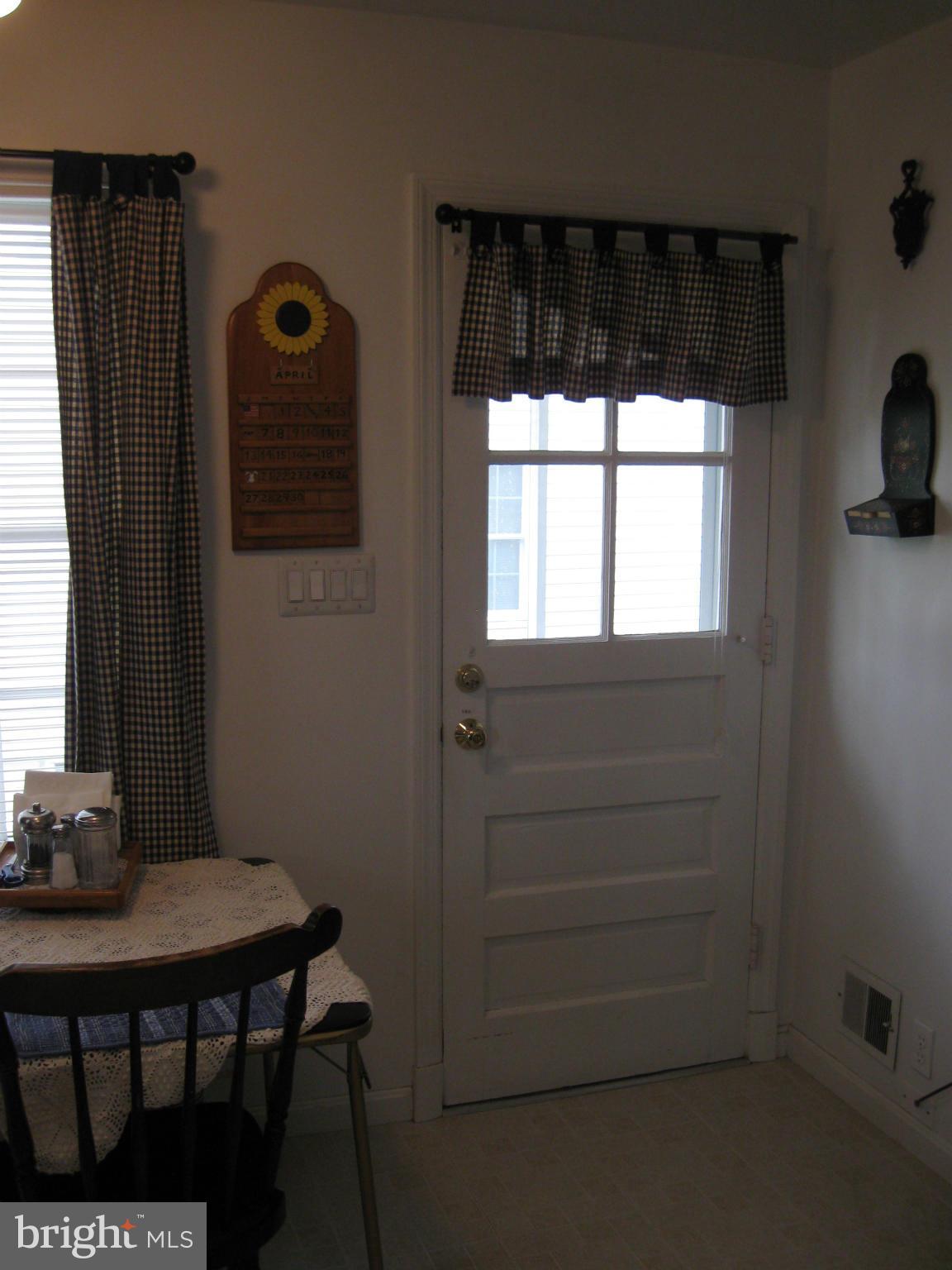 1607 Neely Road Silver Spring, MD 20903 - Photo 10 of 24 Door from kitchen to screened porch