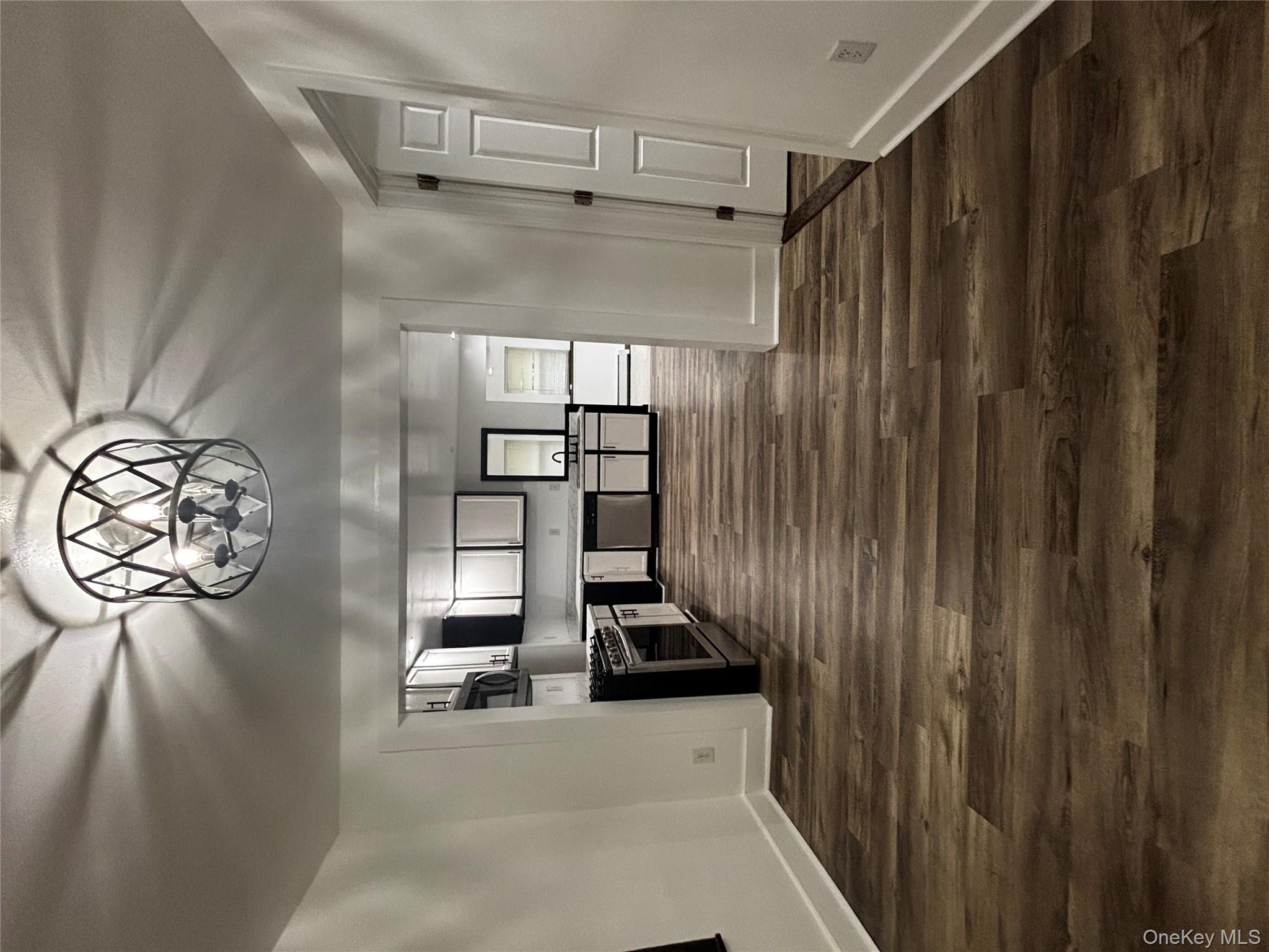 333 Bingham Road Marlboro, NY 12542 - Photo 3 of 27 a view of empty room with wooden floor