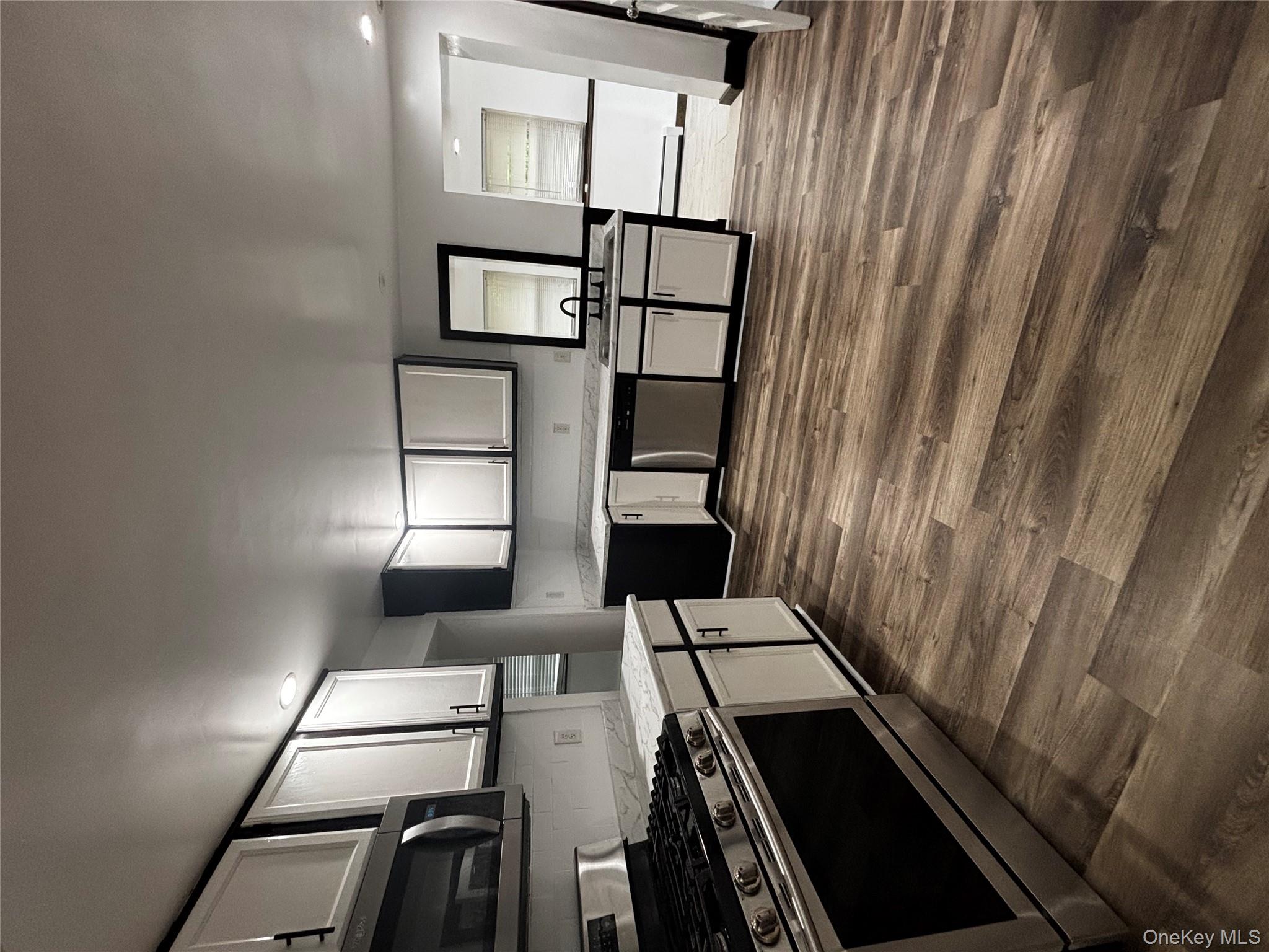 333 Bingham Road Marlboro, NY 12542 - Photo 4 of 27 a large kitchen with stainless steel appliances granite countertop a stove a sink and a refrigerator