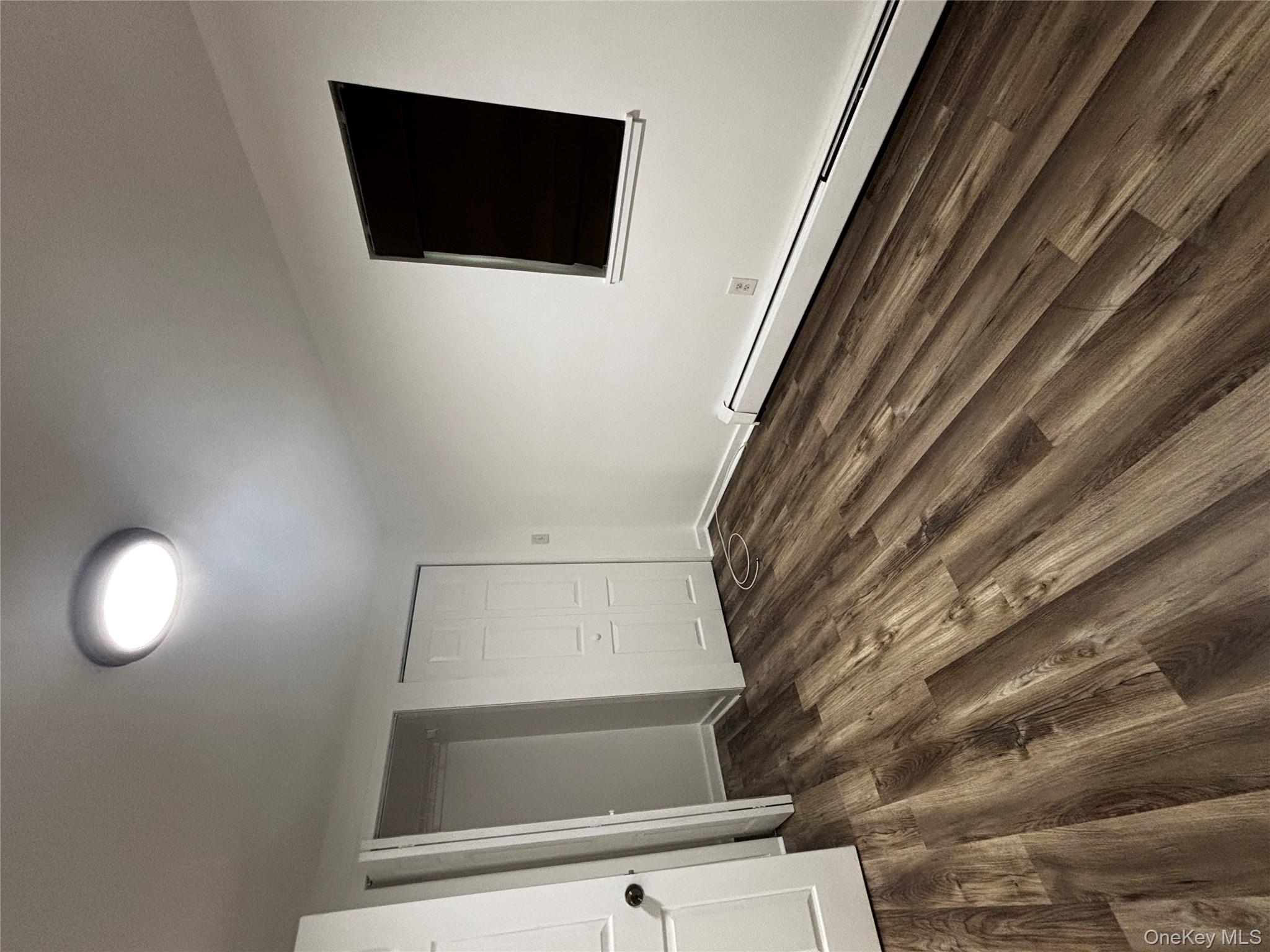 333 Bingham Road Marlboro, NY 12542 - Photo 7 of 27 a view of a livingroom with wooden floor and chair