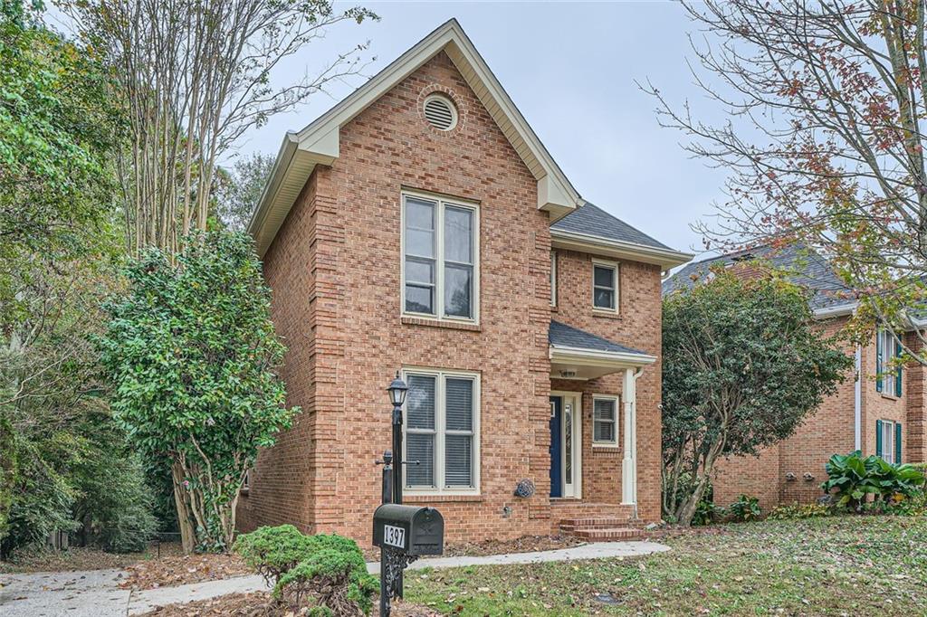 1397 Camden Walk Decatur, GA 30033 - Photo 1 of 1 front view of a house with a yard