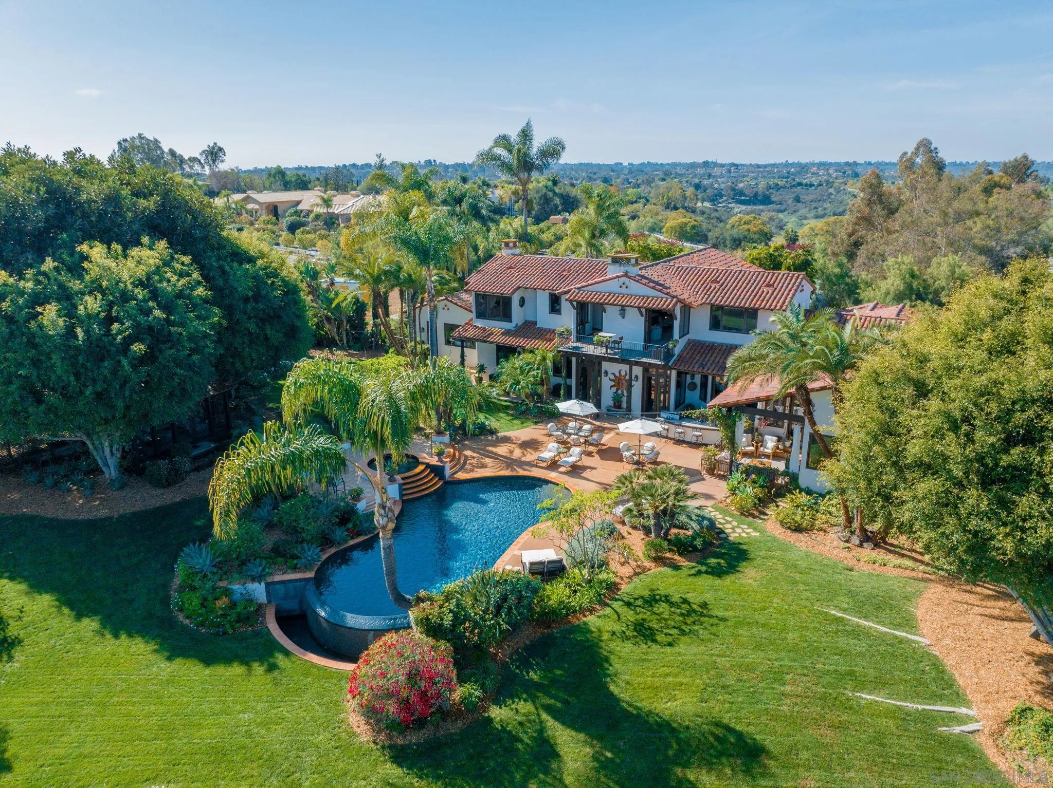 a view of a garden with a lake view