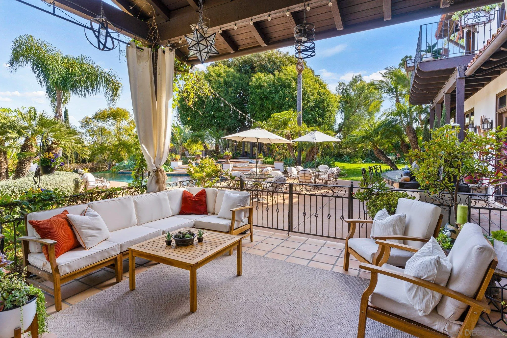 3381 Calle Margarita Encinitas, CA 92024 - Photo 12 of 47 a outdoor living space with patio furniture and a potted plant