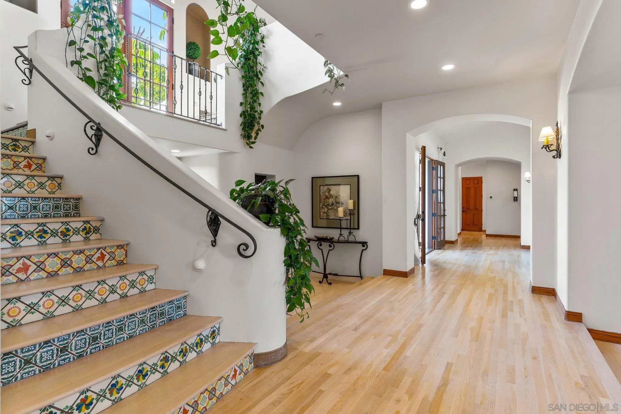 3381 Calle Margarita Encinitas, CA 92024 - Photo 21 of 47 a view of entryway with wooden floor and stairs