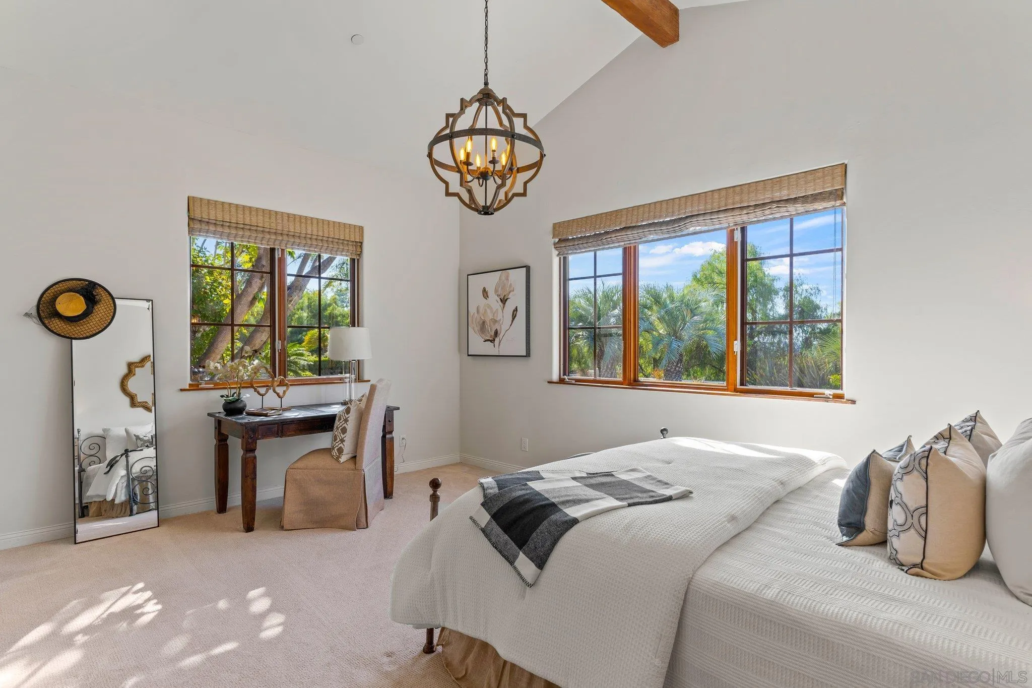 3381 Calle Margarita Encinitas, CA 92024 - Photo 24 of 47 a bedroom with a bed and a table