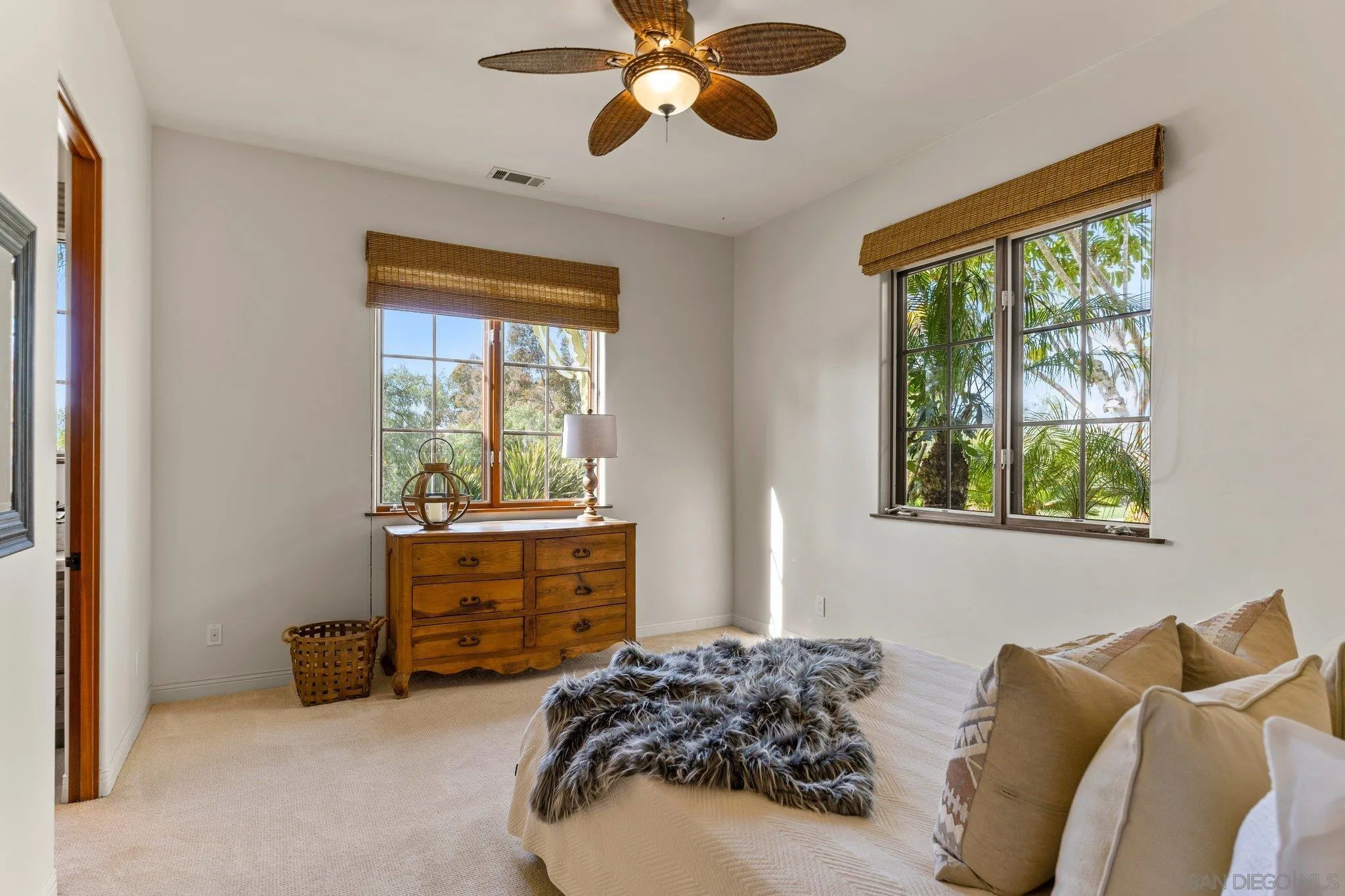 3381 Calle Margarita Encinitas, CA 92024 - Photo 28 of 47 a bedroom with a bed and a window