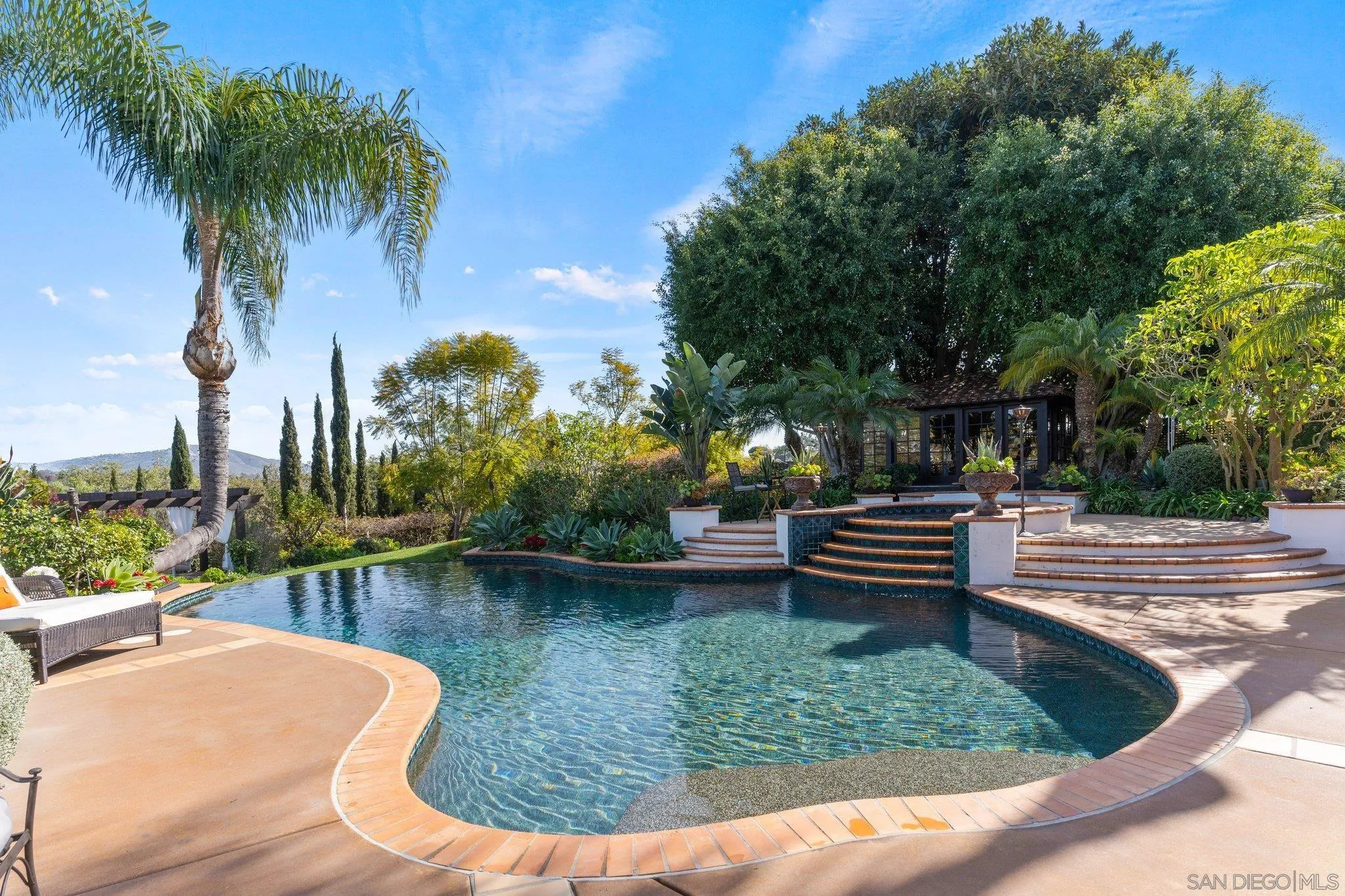 3381 Calle Margarita Encinitas, CA 92024 - Photo 34 of 47 a view of a lake with couches chairs