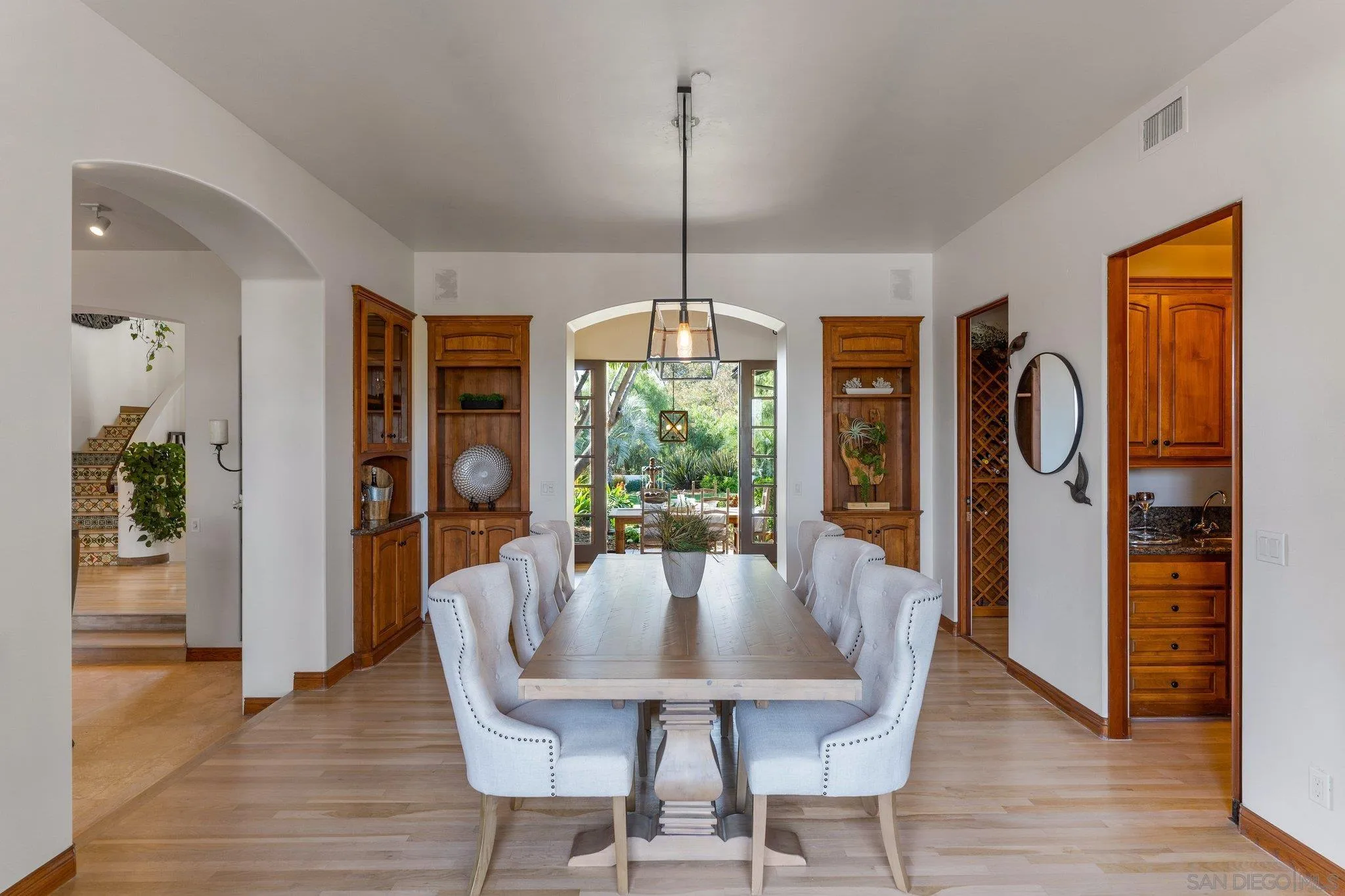 3381 Calle Margarita Encinitas, CA 92024 - Photo 6 of 47 a dining room with furniture window wooden floor