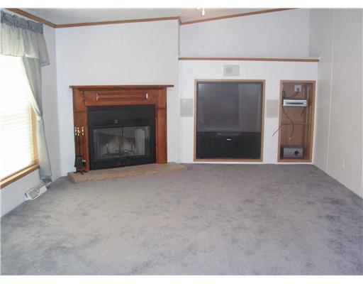 5235 Dutch Ridge Road Beaver, PA 15009 - Photo 6 of 18 Den/Family/Great Room. 17X13 FAMILYROOM WITH A LOG FIREPLACE AND BUILT-IN BIG SCREEN TV.