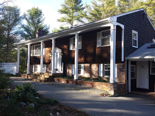 a front view of a house with street